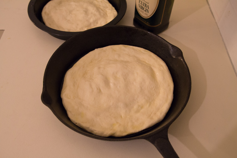 Making the pizza right in the cast iron skillet